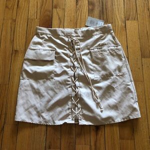 NEVER WORN TAGS ON beige lace up skirt